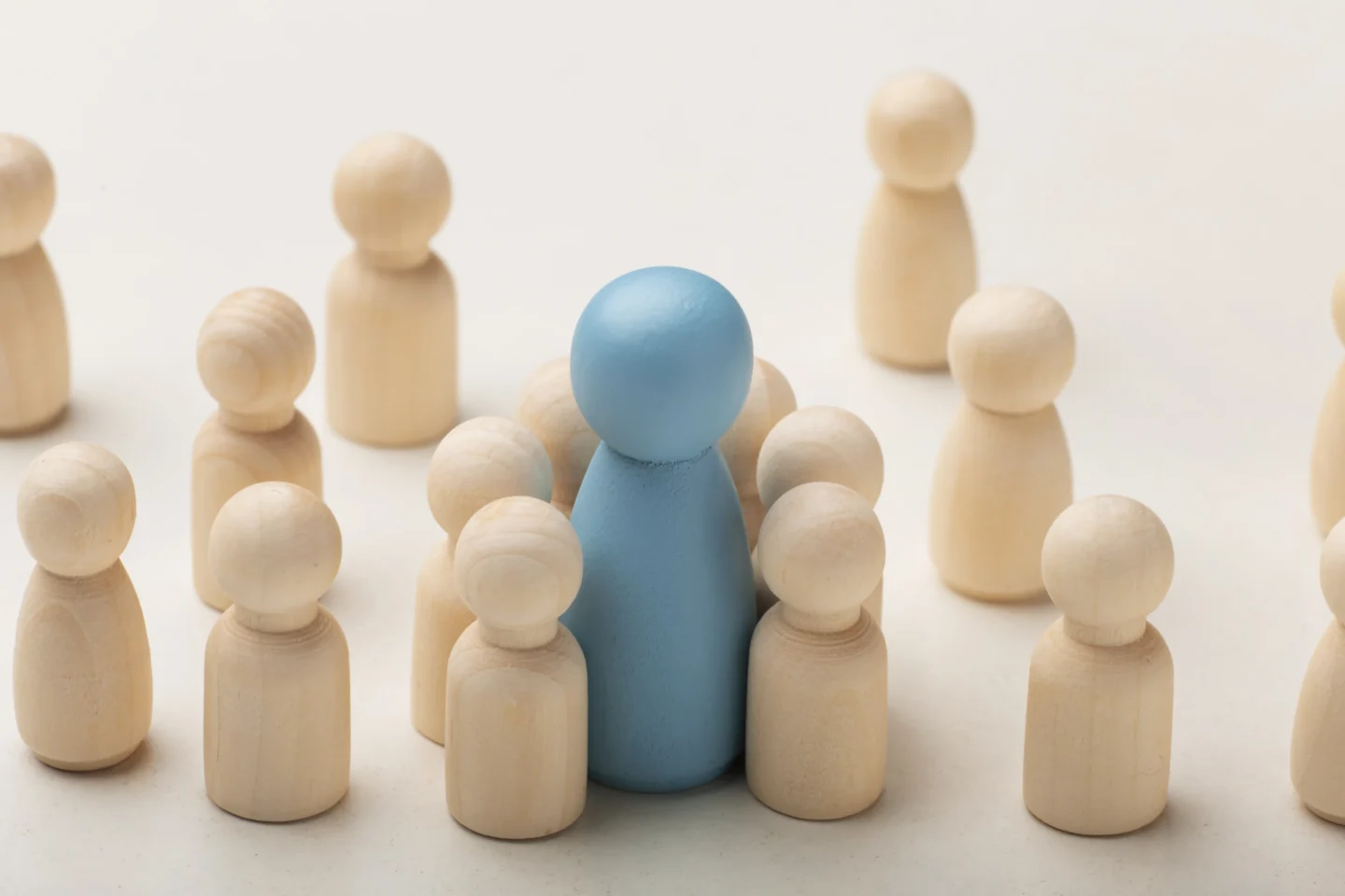 wooden people standing